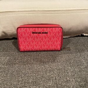 Michael Kors Vibrant Pink zip around wallet. Silver hardware. NWOT No call outs
